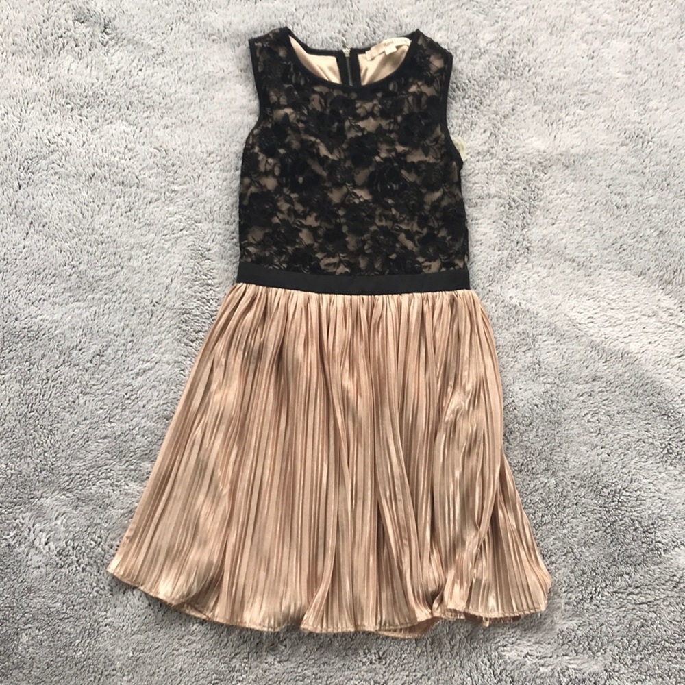 Girls dress! Gold pleated skirt; black lace top.